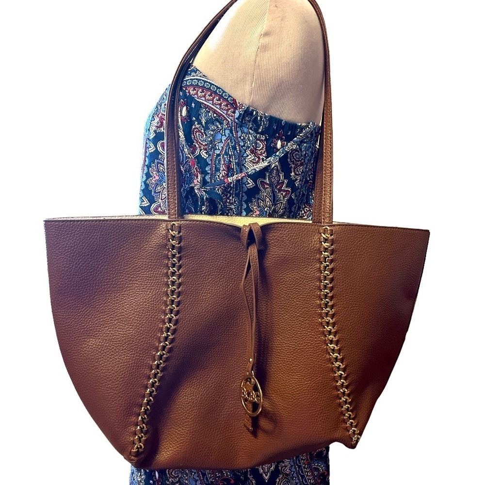 BCBG brown and gold shoulder bag with wide open space inside